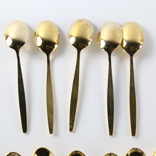 567 - MEKA - a set of 11 Danish vermeil sterling silver and harlequin enamel coffee spoons, length 9cm