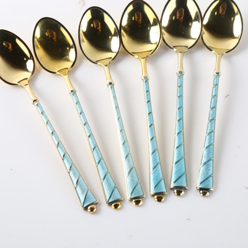 569 - EGON LAURIDSEN - a set of 6 Danish vermeil sterling silver and blue enamel coffee spoons, length 9.5... 