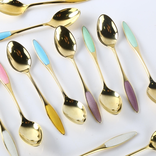 570 - FRIGAST - a set of 12 Danish vermeil sterling silver and harlequin enamel coffee spoons, length 9.5c... 