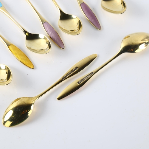 570 - FRIGAST - a set of 12 Danish vermeil sterling silver and harlequin enamel coffee spoons, length 9.5c... 