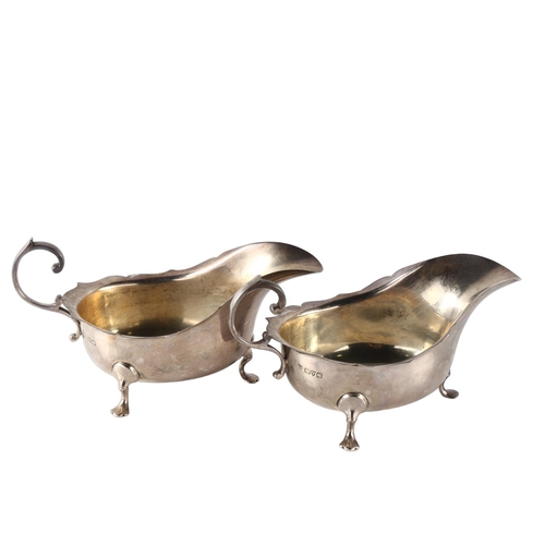 586 - A pair of George V silver sauce boats, with C-shaped handles, by Barker Brothers Ltd, hallmarks Ches... 