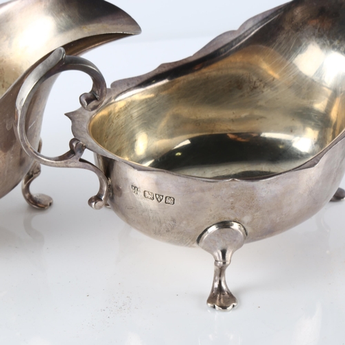 586 - A pair of George V silver sauce boats, with C-shaped handles, by Barker Brothers Ltd, hallmarks Ches... 