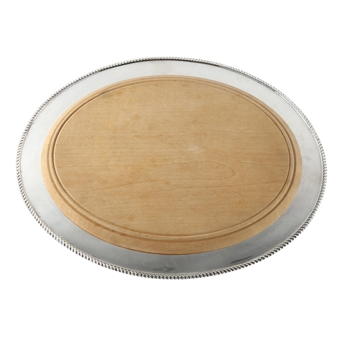 591 - A George V oval silver tray, with wood breadboard insert, and gadrooned rim, by J B Chatterley & Son... 