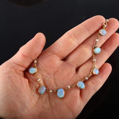 101 - An Edwardian 9ct gold opal and pearl fringe necklace, set with oval cabochon white opals, with seed ... 