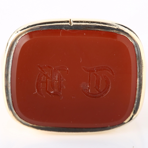 108 - An Antique carnelian seal fob, intaglio carved with initials, in unmarked gold mount, seal length 19... 