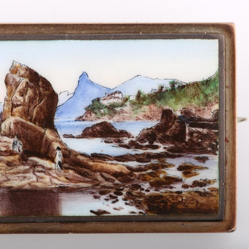 112 - An Antique enamel coastal scene brooch, unmarked silver settings with hand painted watercolour panel... 