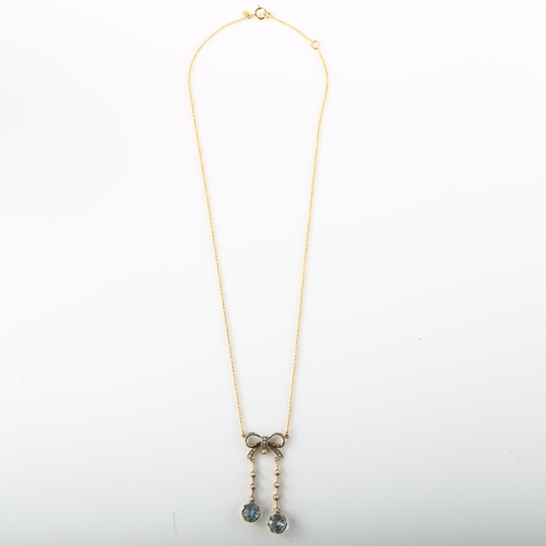 121 - A modern 9ct gold blue topaz pearl and diamond ribbon bow negligee pendant necklace, in Edwardian st... 