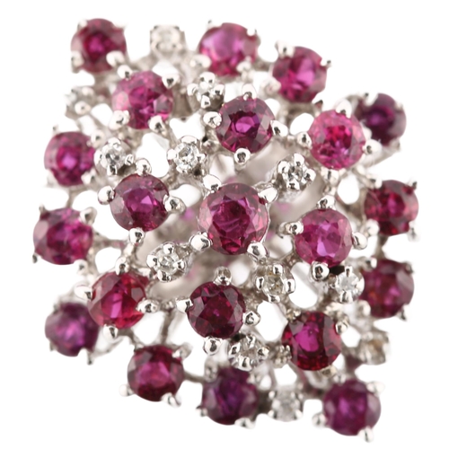 124 - A large 18ct white gold ruby and diamond cocktail ring, set with round-cut rubies and single-cut dia... 