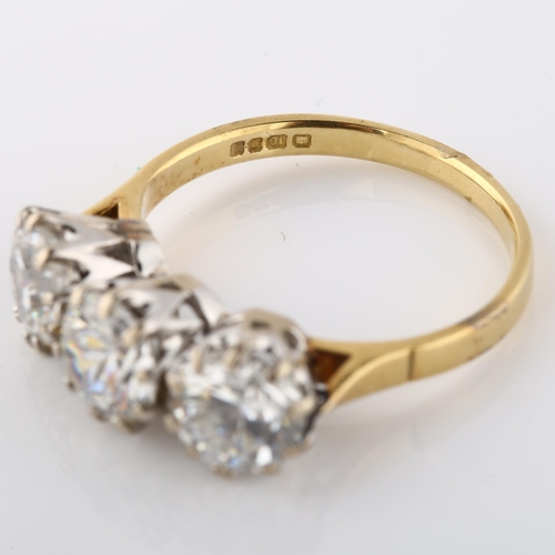 126 - An 18ct gold three stone paste ring, set with modern round brilliant-cut paste, paste measures: 7.00... 