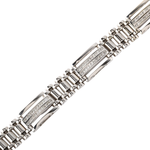 129 - A heavy 14ct white gold diamond panel bracelet, set with Princess-cut diamonds, total diamond conten... 