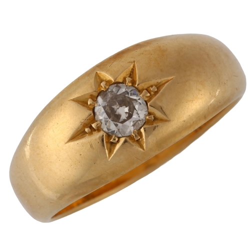 134 - An early 20th century 18ct gold 0.25ct solitaire diamond gypsy ring, set with transitional-cut diamo... 