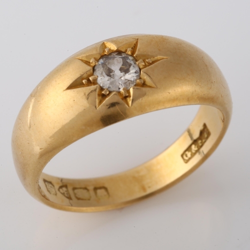 134 - An early 20th century 18ct gold 0.25ct solitaire diamond gypsy ring, set with transitional-cut diamo... 