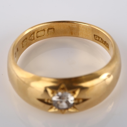 134 - An early 20th century 18ct gold 0.25ct solitaire diamond gypsy ring, set with transitional-cut diamo... 