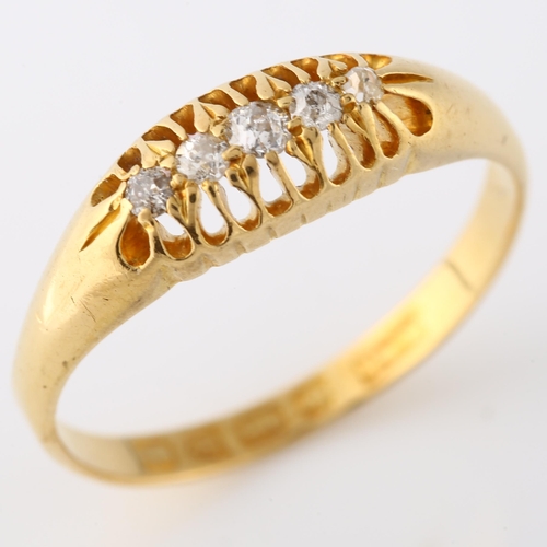 136 - An early 20th century 18ct gold graduated five stone diamond half hoop ring, set with old European-c... 