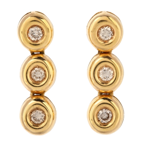 143 - A pair of 18ct gold three stone diamond line drop earrings, set with modern round brilliant-cut diam... 