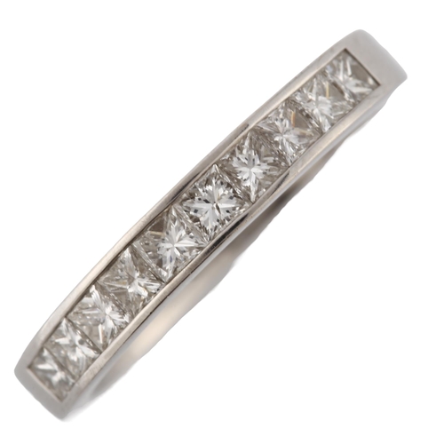 144 - An 18ct white gold diamond half eternity ring, set with Princess-cut diamonds, total diamond content... 