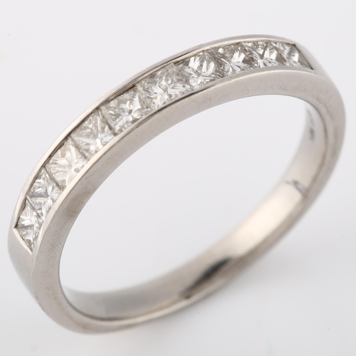 144 - An 18ct white gold diamond half eternity ring, set with Princess-cut diamonds, total diamond content... 