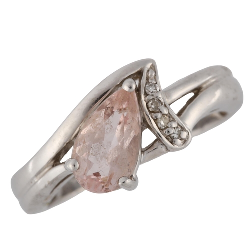 146 - A modern 9ct white gold pink stone and diamond dress ring, setting height 9mm, size K, 3.4g