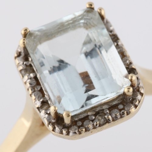 147 - A modern 9ct gold aquamarine and diamond cluster ring, set with emerald-cut aqua and brilliant-cut d... 