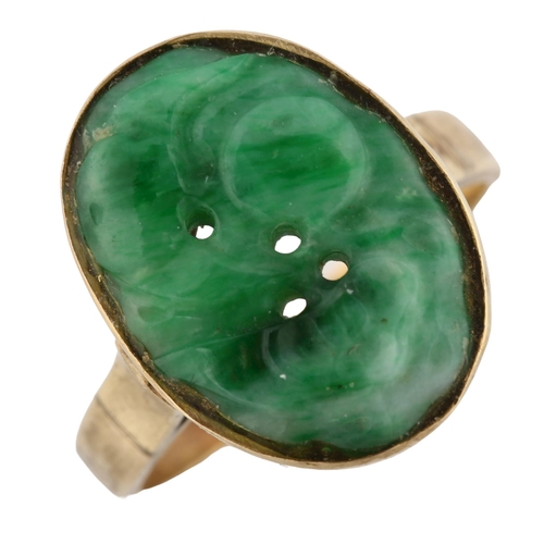 153 - A Chinese 18ct gold jade panel ring, relief carved and pierced decoration, setting height 18.8mm, si... 