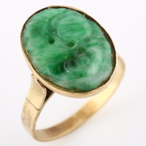 153 - A Chinese 18ct gold jade panel ring, relief carved and pierced decoration, setting height 18.8mm, si... 