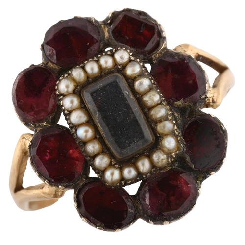 159 - A large Georgian garnet and pearl cluster memorial ring, unmarked gold closed-back settings with cen... 