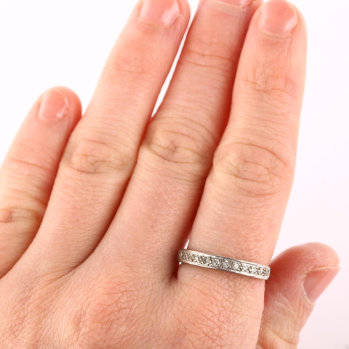 163 - An 18ct white gold diamond half eternity ring set with single-cut diamonds, hallmarks London 1961, s... 