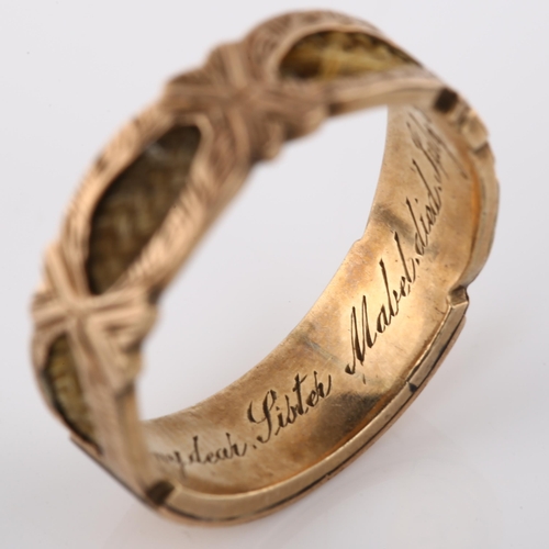 164 - A Victorian 9ct gold memorial band ring, with central engraved panel inscribed Mabel with woven hair... 