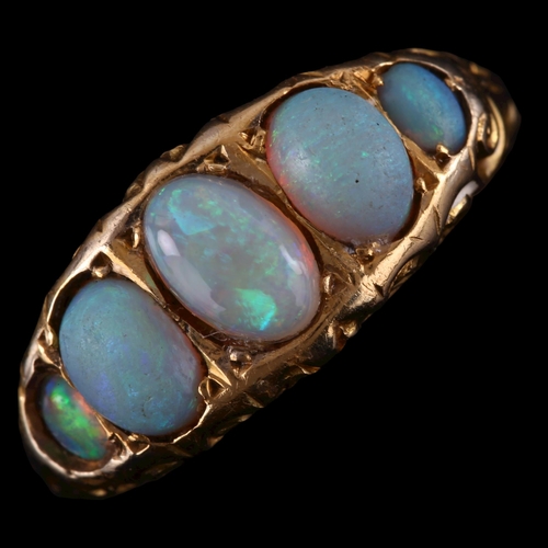 167 - An early 20th century 18ct gold graduated five stone opal half hoop ring, set with oval cabochon opa... 