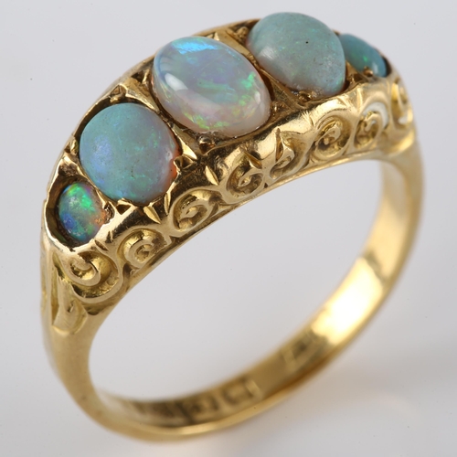 167 - An early 20th century 18ct gold graduated five stone opal half hoop ring, set with oval cabochon opa... 