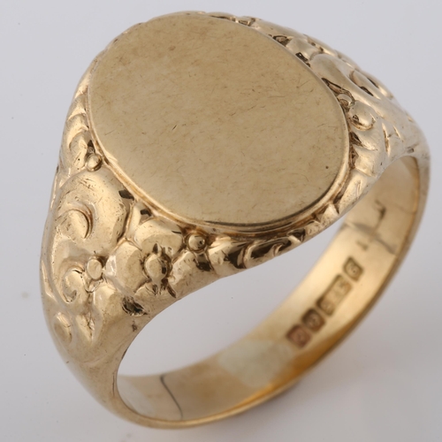 170 - A mid-20th century 9ct gold unascribed signet ring, relief embossed foliate shoulders, hallmarks Bir... 