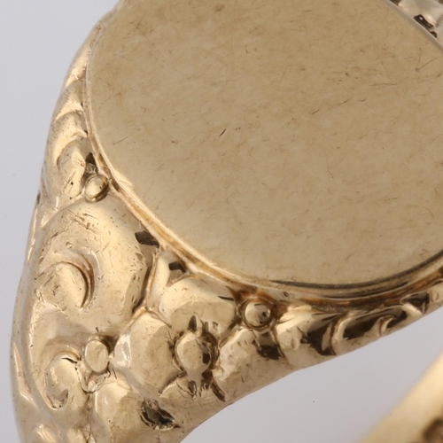 170 - A mid-20th century 9ct gold unascribed signet ring, relief embossed foliate shoulders, hallmarks Bir... 