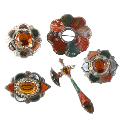 174 - A group of Scottish hardstone brooches, including axe example, unmarked silver settings, axe length ... 