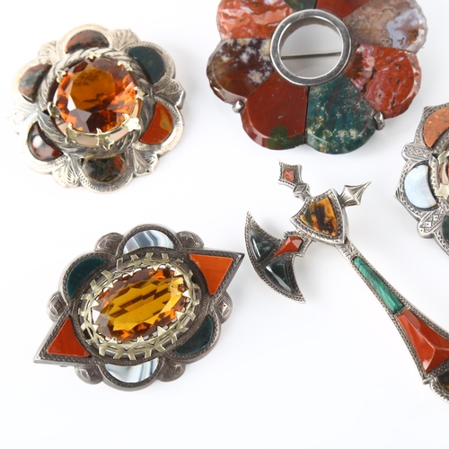 174 - A group of Scottish hardstone brooches, including axe example, unmarked silver settings, axe length ... 