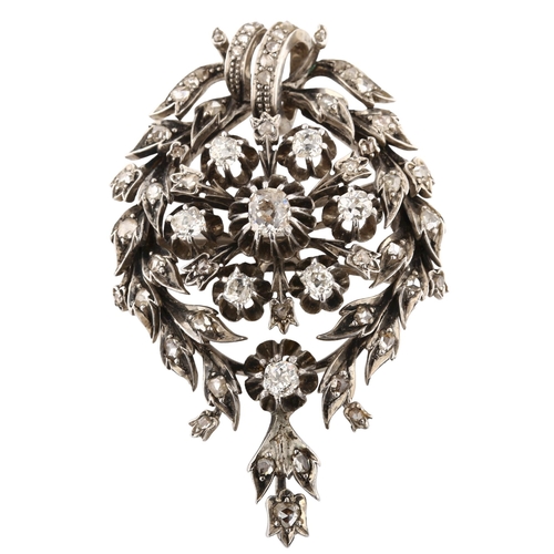 189 - An Antique diamond laurel brooch, unmarked white metal settings, set with old and rose-cut diamonds,... 