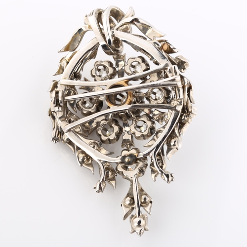 189 - An Antique diamond laurel brooch, unmarked white metal settings, set with old and rose-cut diamonds,... 