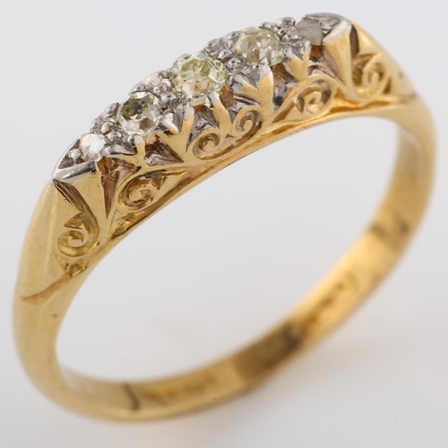 195 - An early 20th century 18ct gold graduated five stone diamond half hoop ring, set with old and rose-c... 