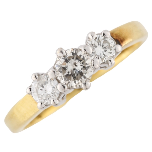 196 - An 18ct gold three stone diamond ring, set with modern round brilliant-cut diamond, total diamond co... 