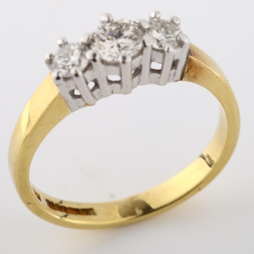 196 - An 18ct gold three stone diamond ring, set with modern round brilliant-cut diamond, total diamond co... 