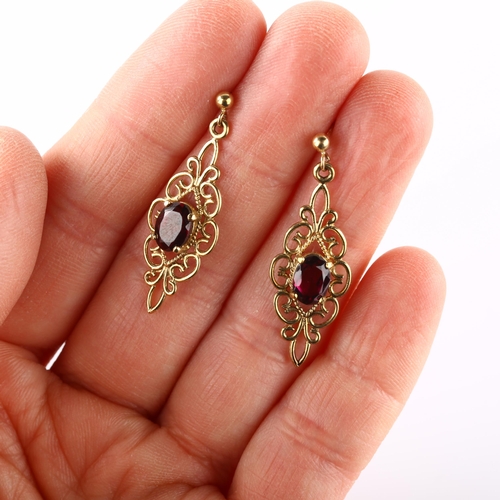 264 - A pair of 9ct gold garnet drop earrings, in Edwardian style with stud fittings, earring height 32.8m... 