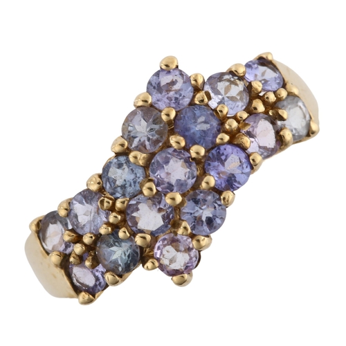 267 - A modern 9ct gold tanzanite crossover ring, setting height 11.7mm, size P, 2.8g