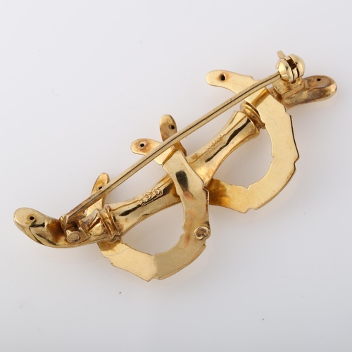 268 - A Victorian 9ct gold horseshoe brooch, in simulated bamboo style, brooch length 42.5mm, 2.2g