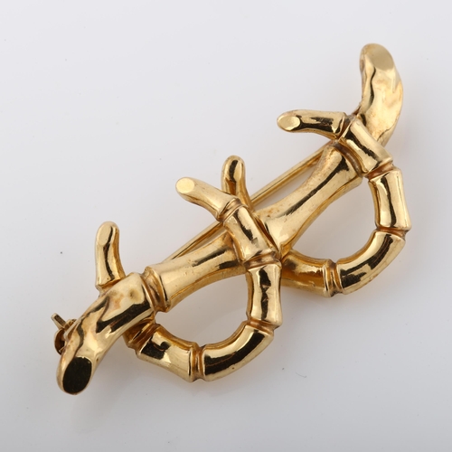 268 - A Victorian 9ct gold horseshoe brooch, in simulated bamboo style, brooch length 42.5mm, 2.2g