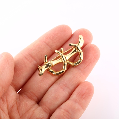 268 - A Victorian 9ct gold horseshoe brooch, in simulated bamboo style, brooch length 42.5mm, 2.2g