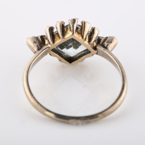 271 - An Art Deco style aquamarine and diamond cluster ring, unmarked white metal settings with square-cut... 