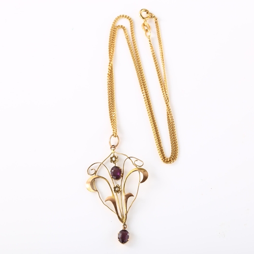 347 - An Edwardian 9ct rose gold amethyst and pearl openwork pendant necklace, on 9ct fine curb link chain... 