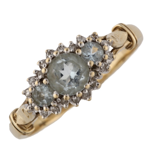 348 - A 9ct gold aquamarine and diamond cluster dress ring, setting height 8.8mm, size T, 3.1g