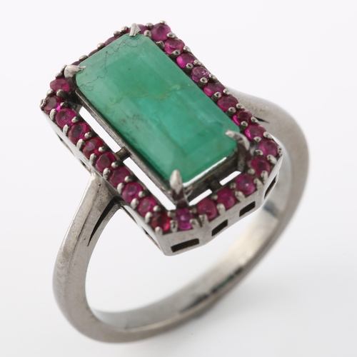 357 - A modern emerald and ruby cluster ring, unmarked white metal settings, setting height 16.6mm, size N... 