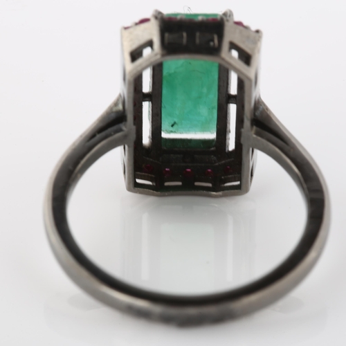 357 - A modern emerald and ruby cluster ring, unmarked white metal settings, setting height 16.6mm, size N... 