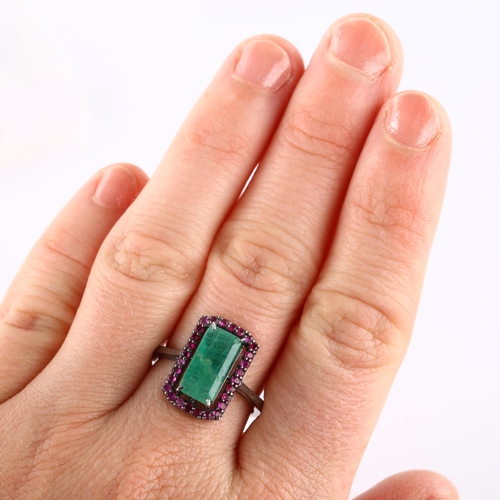 357 - A modern emerald and ruby cluster ring, unmarked white metal settings, setting height 16.6mm, size N... 